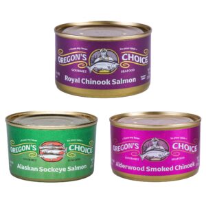 Premium 3-Can Salmon Sampler Pack by Oregon's Choice Gourmet, featuring Royal Chinook Lightly Salted, Alderwood Smoked Chinook, and Alaskan Sockeye Salmon, 7.5 oz each, showcasing sustainable, high-quality salmon packed in non-BPA cans.